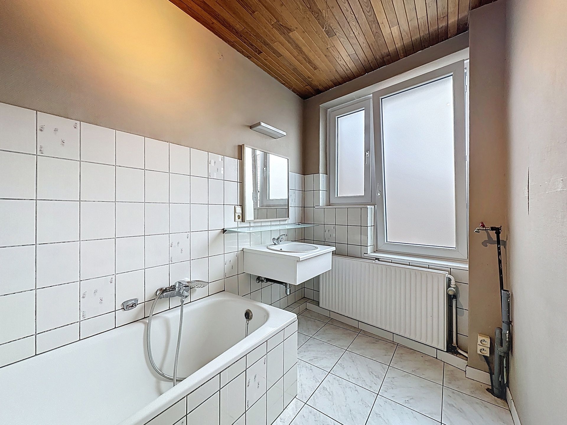 Een ruime te renoveren rijwoning van 207m² met zonnig terras foto 10