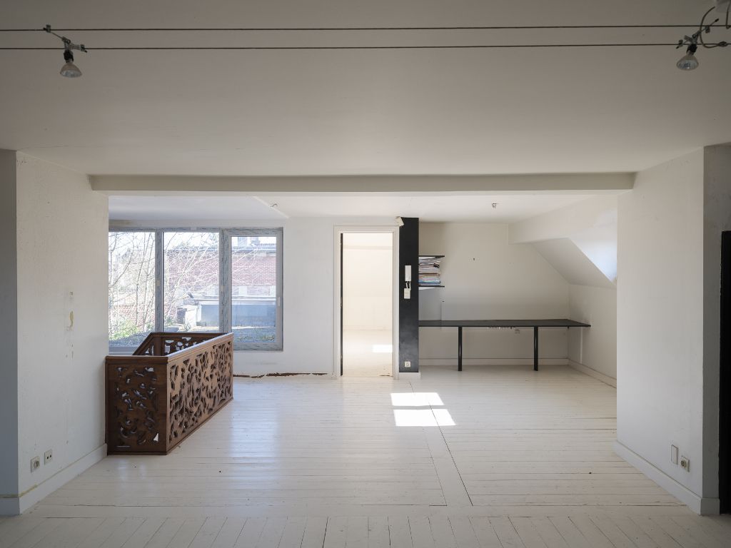 Voormalige dokterswoning met praktijkruimte en stadstuin foto 17