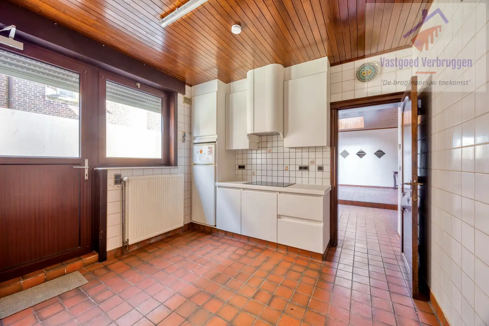 Ruime woning vergund als kamerwoning (3 kamers) met winkelruimte foto 5