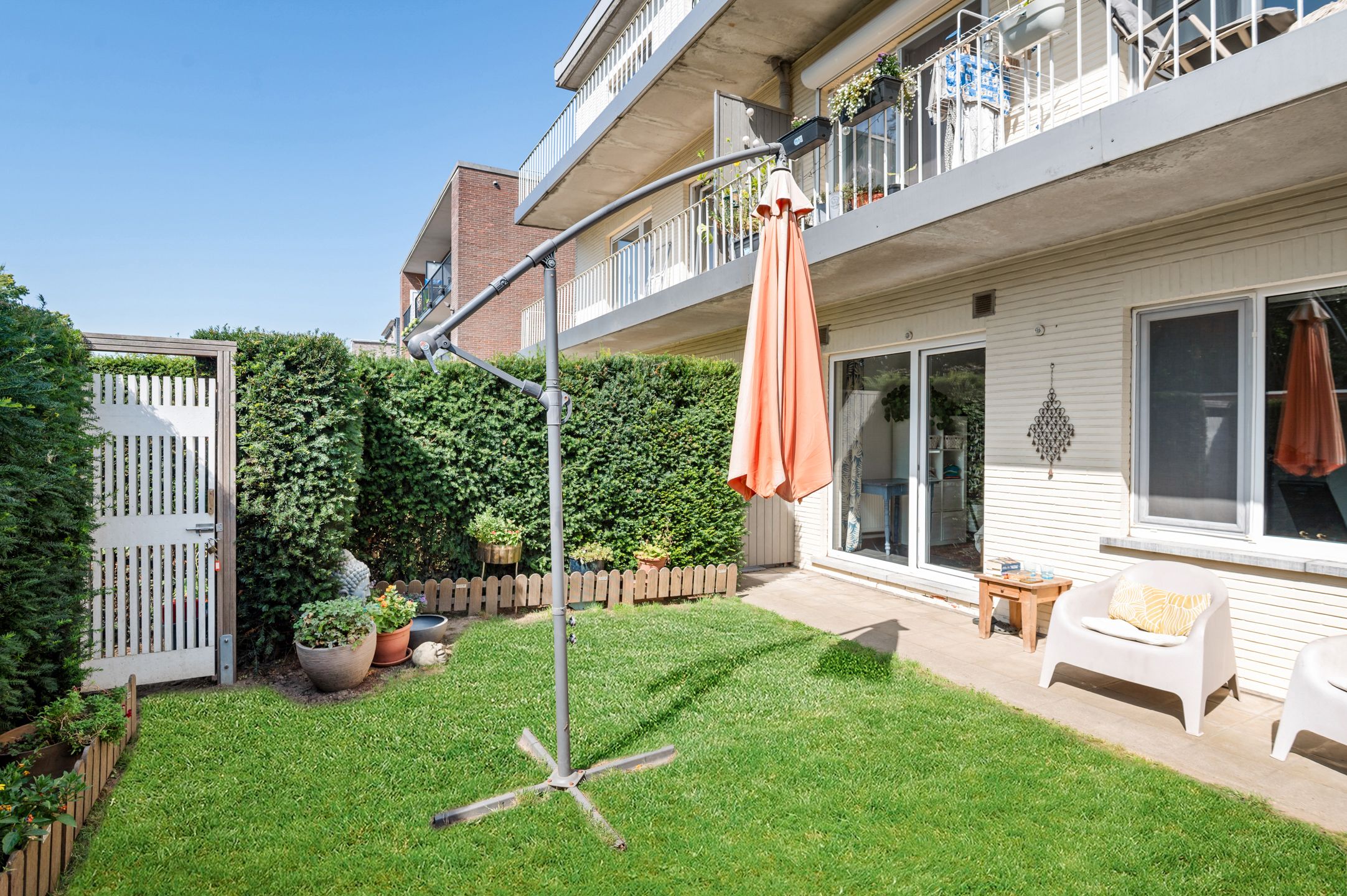 Mooi gelijkvloers appartement met 2 slk., tuin en garagebox foto 13