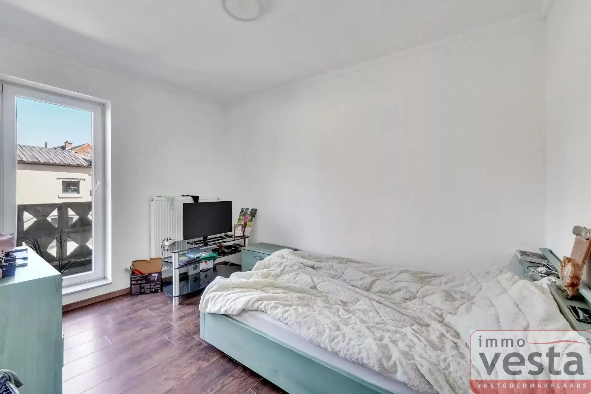 Ruime rijwoning op wandelafstand van centrum foto 14