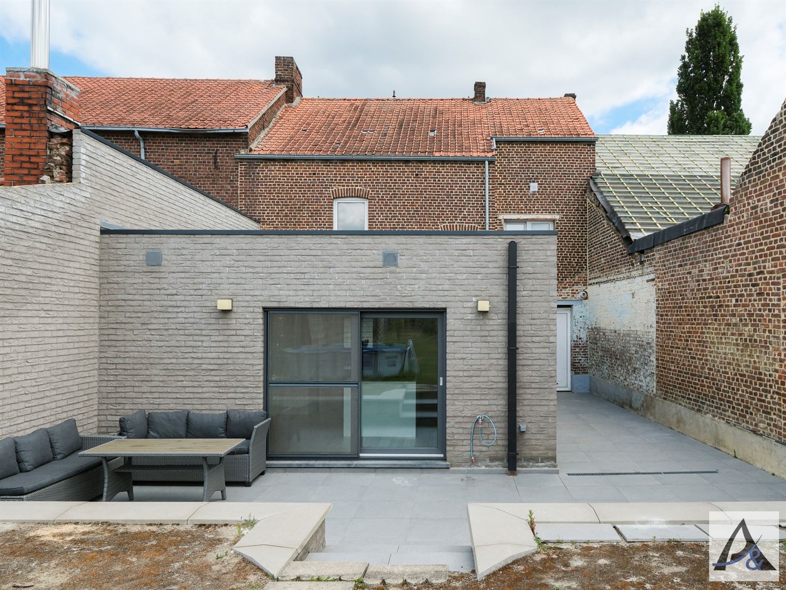 Instapklare gezinswoning met tuin en garage in hartje Munsterbilzen foto 5