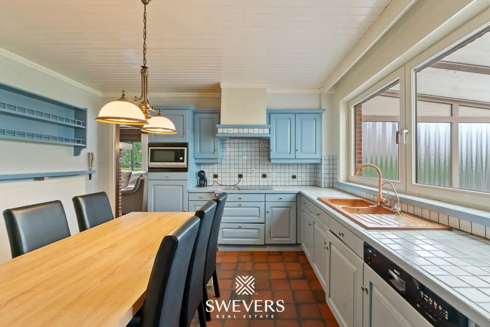 Karaktervolle gezinswoning met veel potentieel op een perceel van 13a55ca in hartje Heusden-Zolder foto 12