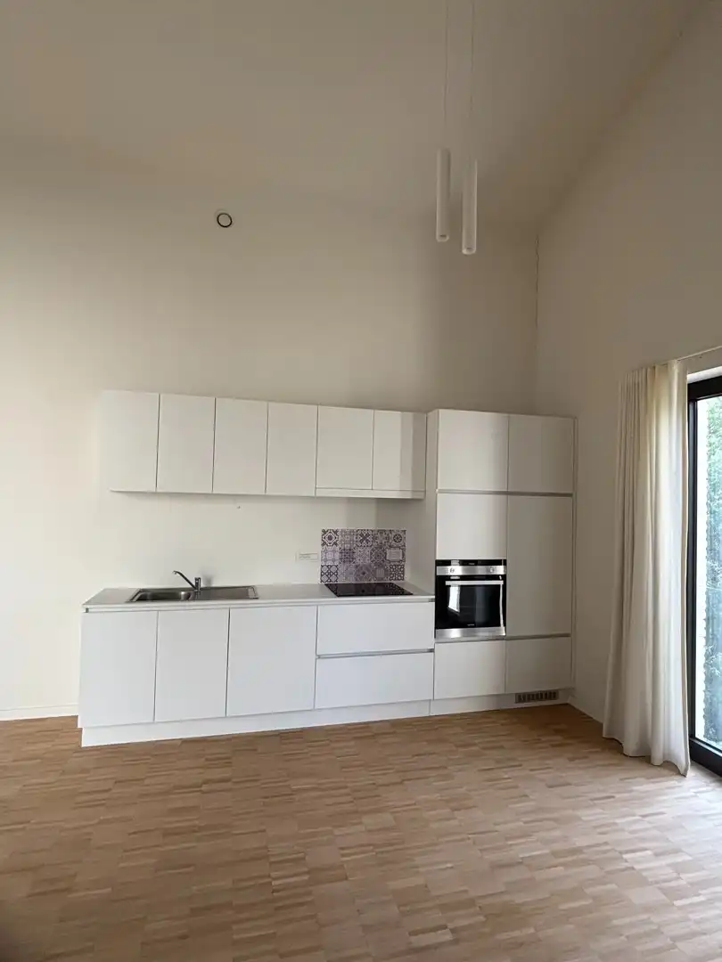 Exclusief te huur: Modern appartement op toplocatie aan de Grote Steenweg, Olsene – perfect voor de moderne levensstijl. foto 8
