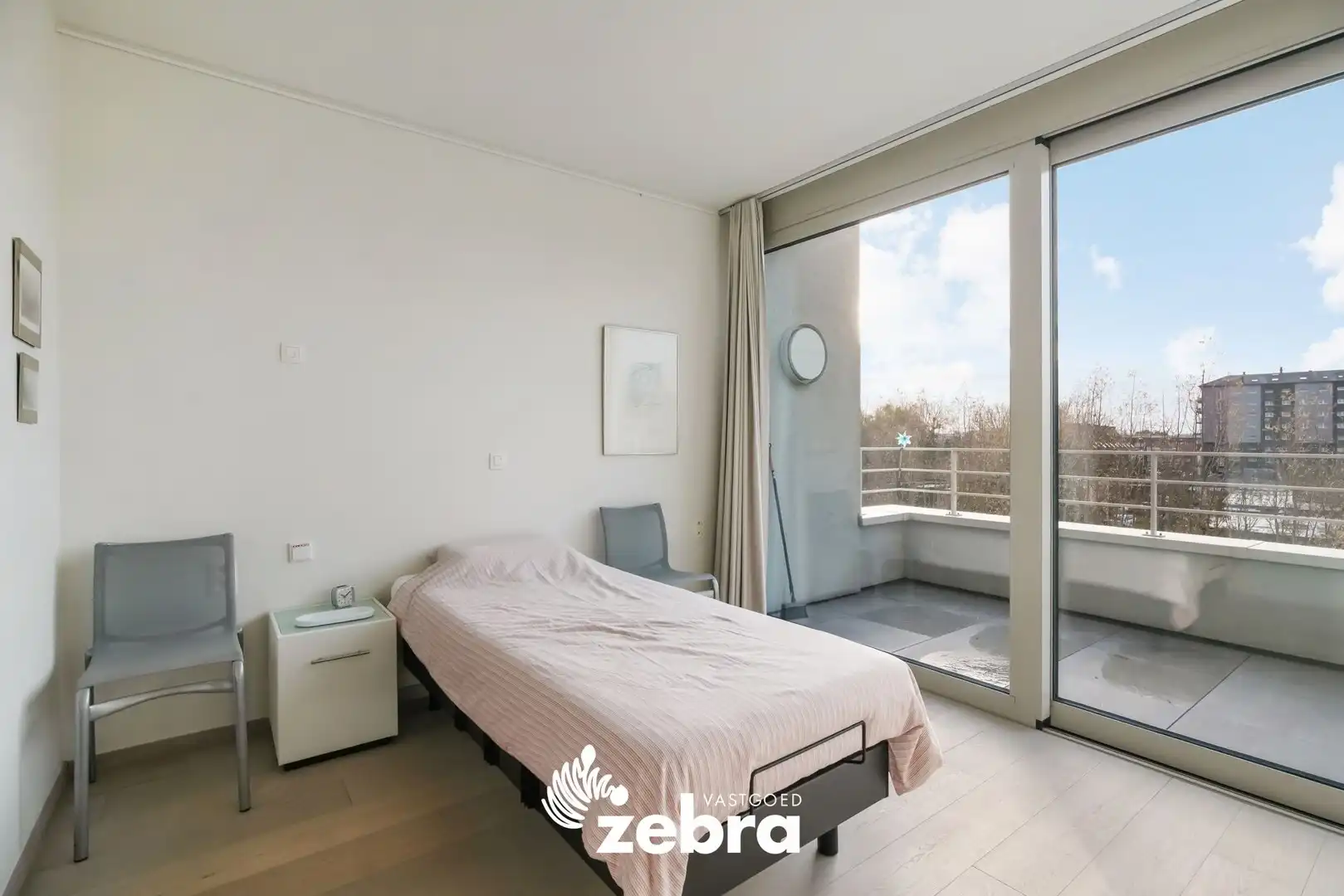 Moderne serviceflat met prachtig zicht op de Leie en autostaanplaats te Deinze! foto 12