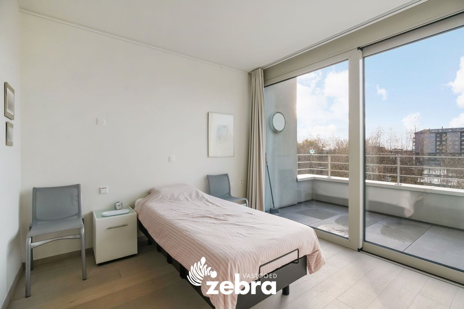 Moderne serviceflat met prachtig zicht op de Leie en autostaanplaats te Deinze! foto 12