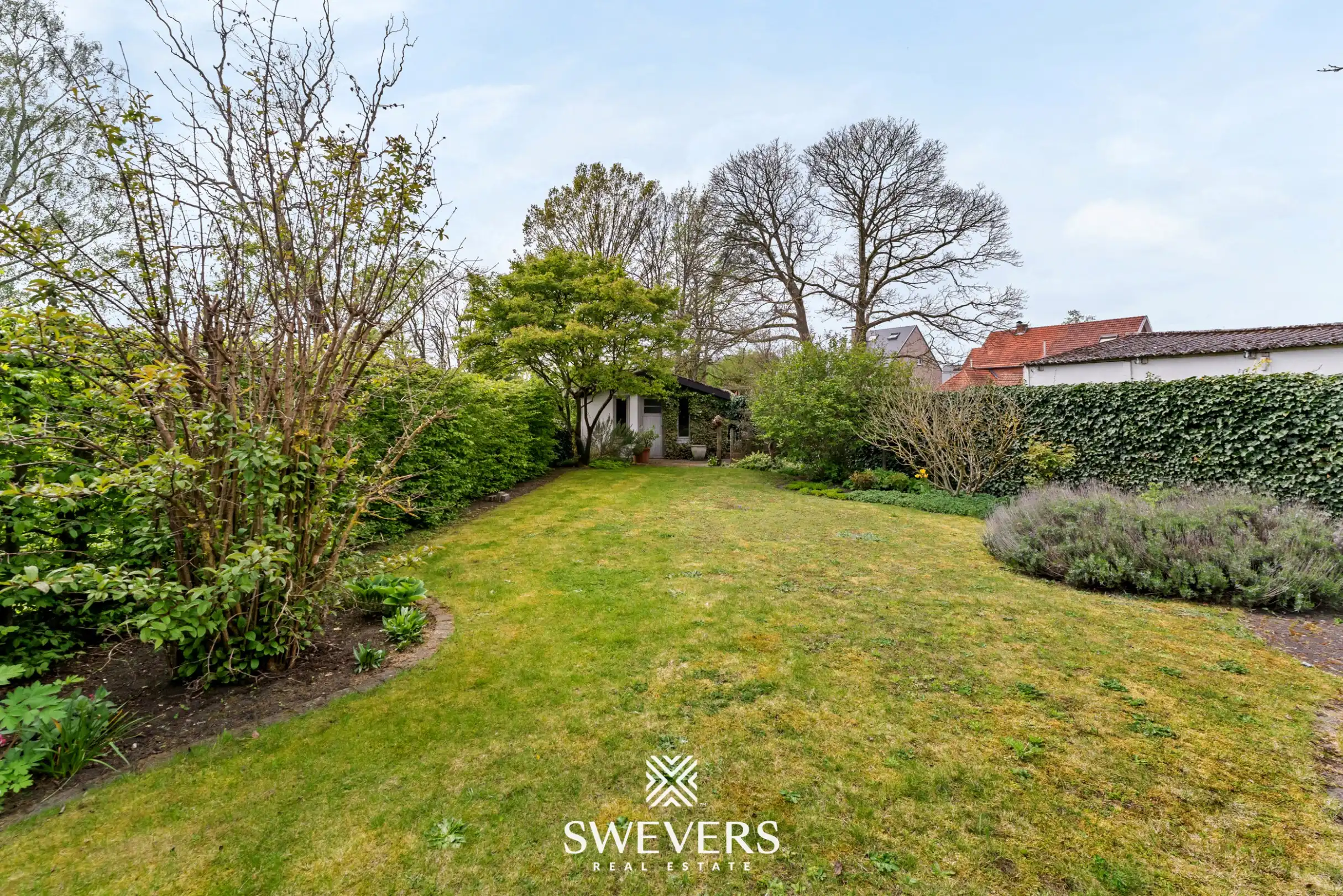 Verrassend ruime woning tot 5 à 6 slaapkamers in het centrum van Zonhoven foto 24