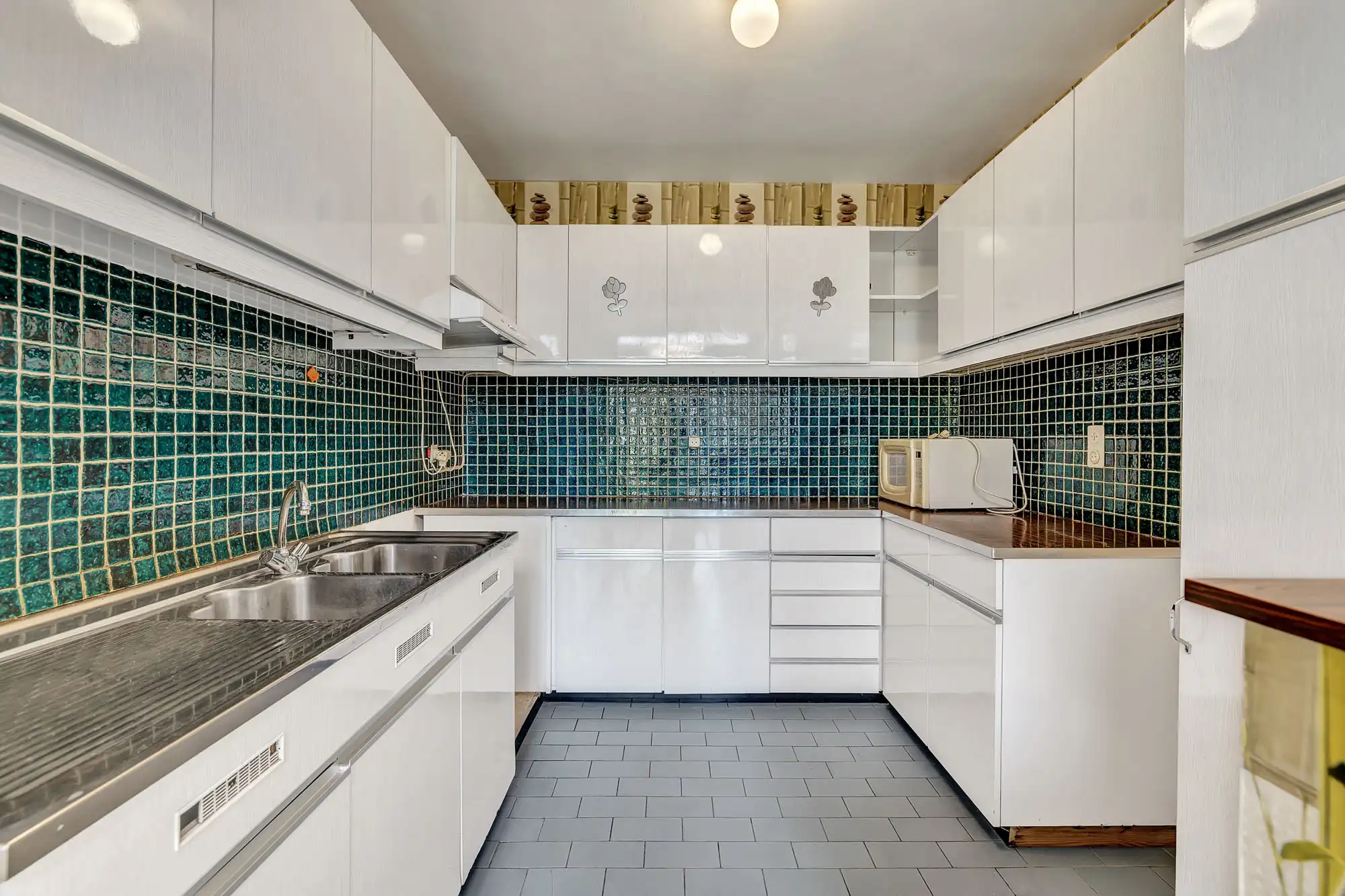 Halfopen bebouwing met garage en tuin in Ternat! foto 3