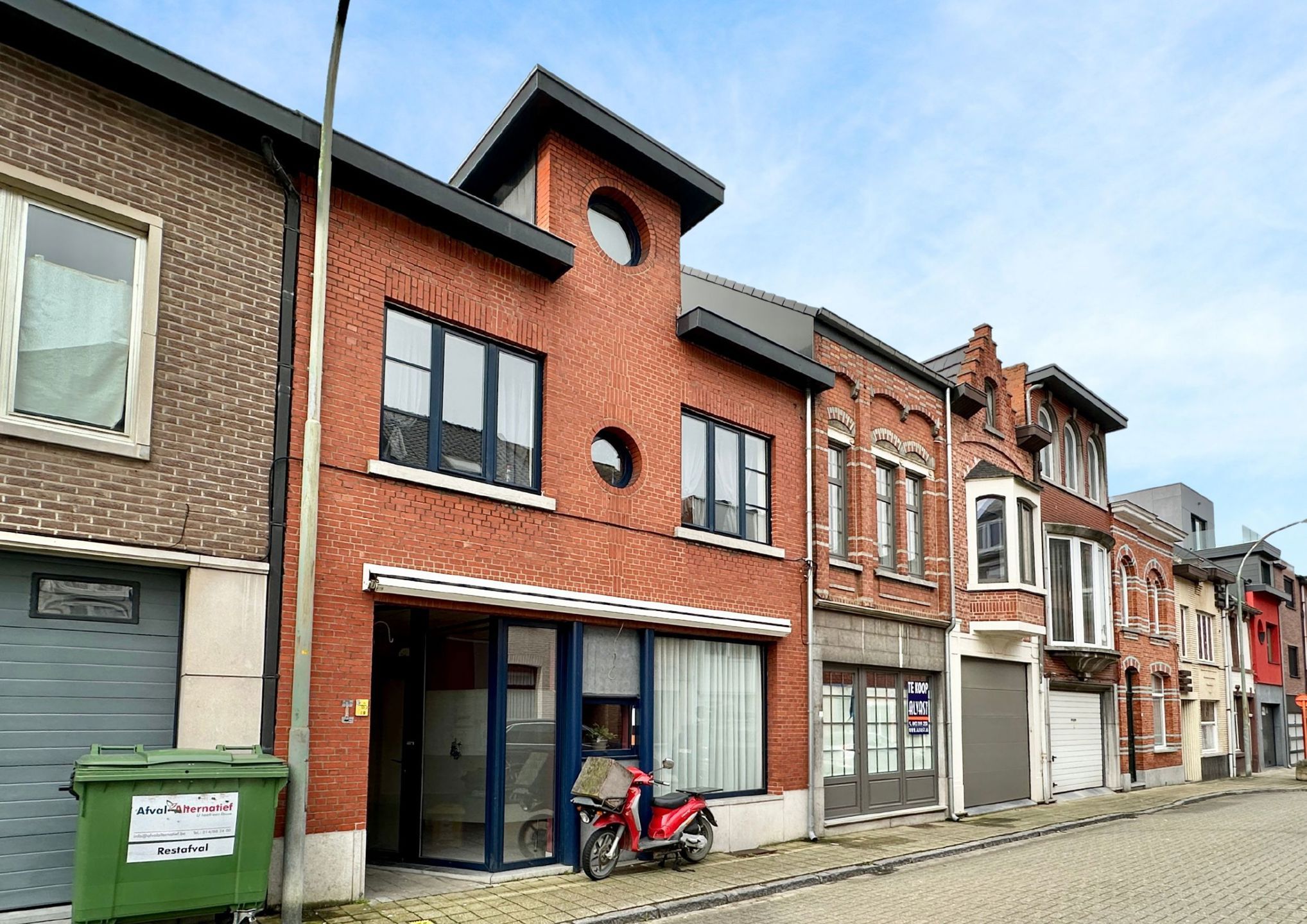 Centraal gelegen woning met gelijkvloerse handelsruimte foto 1