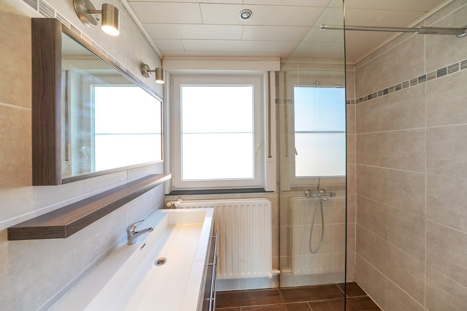 Halfopen woning te koop in de Mandelwijk te Oudenburg. foto 12