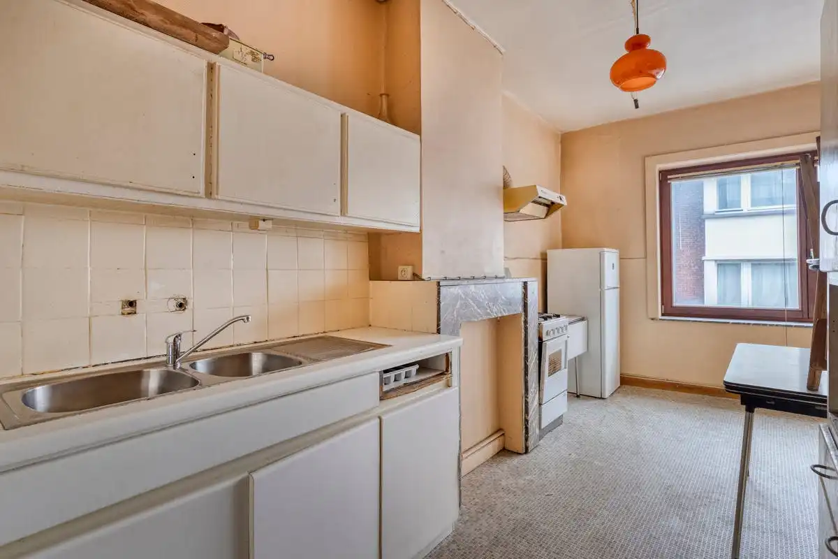 Opbrengsteigendom met renovatiepotentieel op toplocatie in Kortrijk foto 19