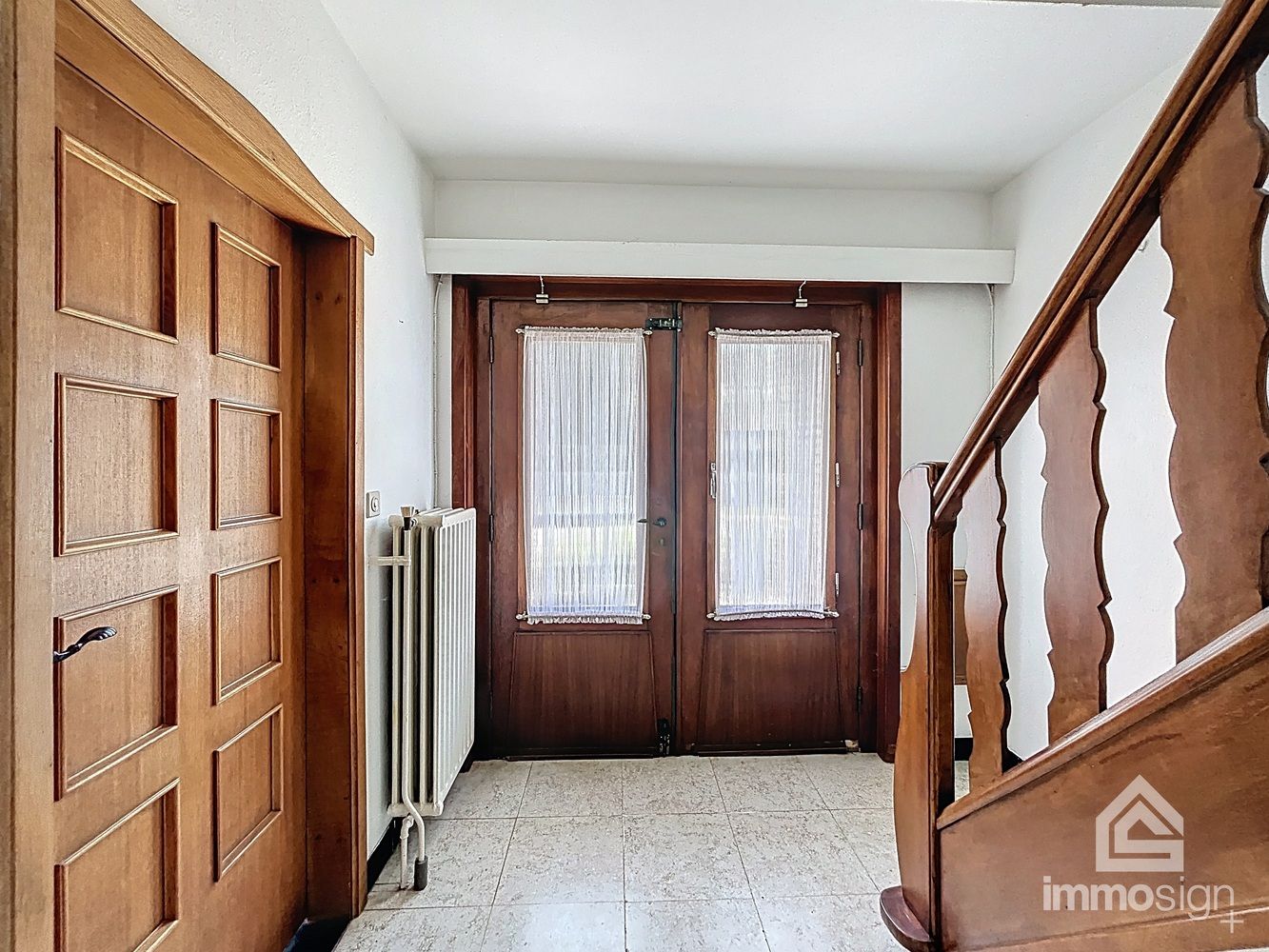 Charmante gezinswoning met potentieel op ruim hoekperceel in hartje Eksel foto 3