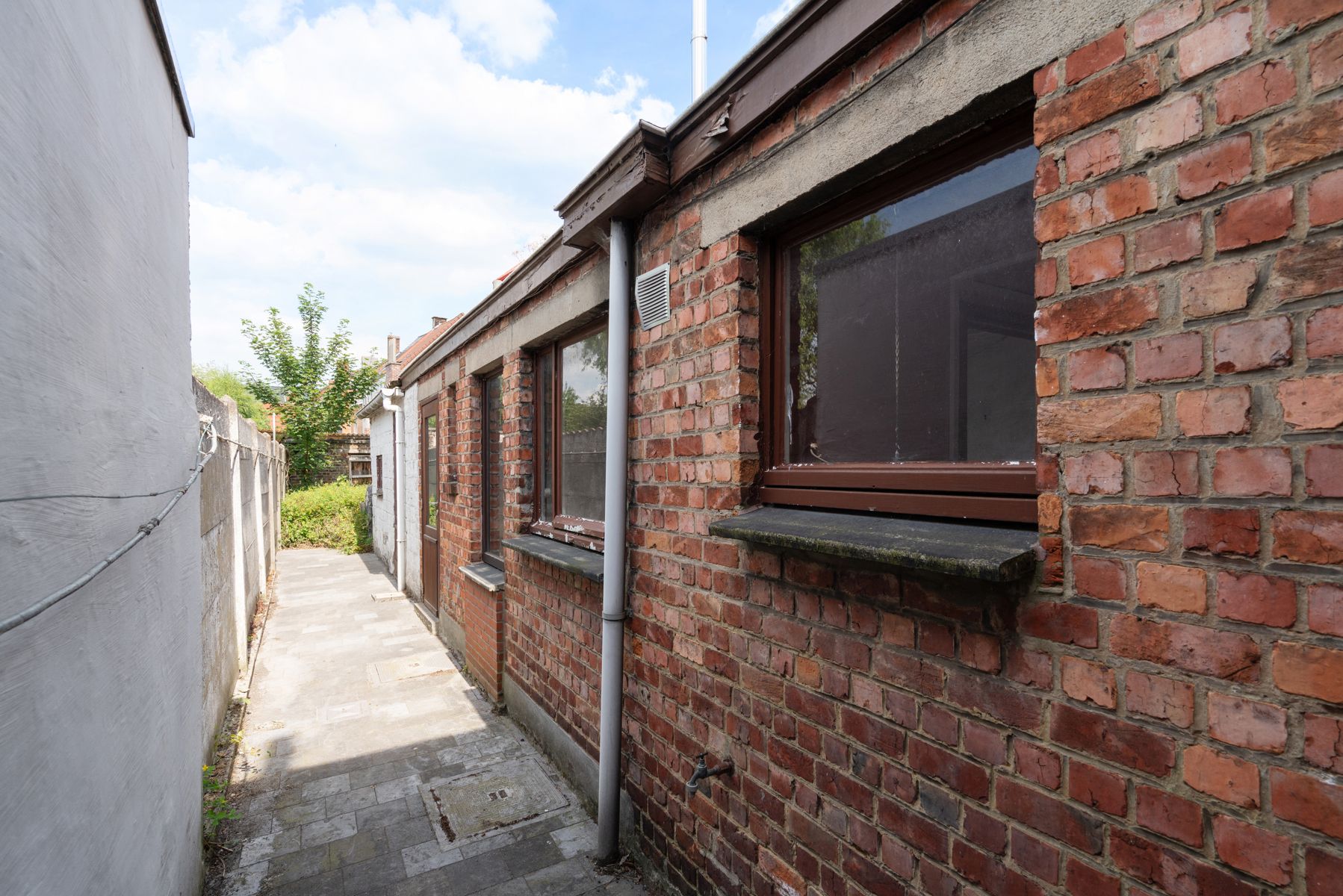 Te renoveren woning met tuin in Gentbrugge foto 15