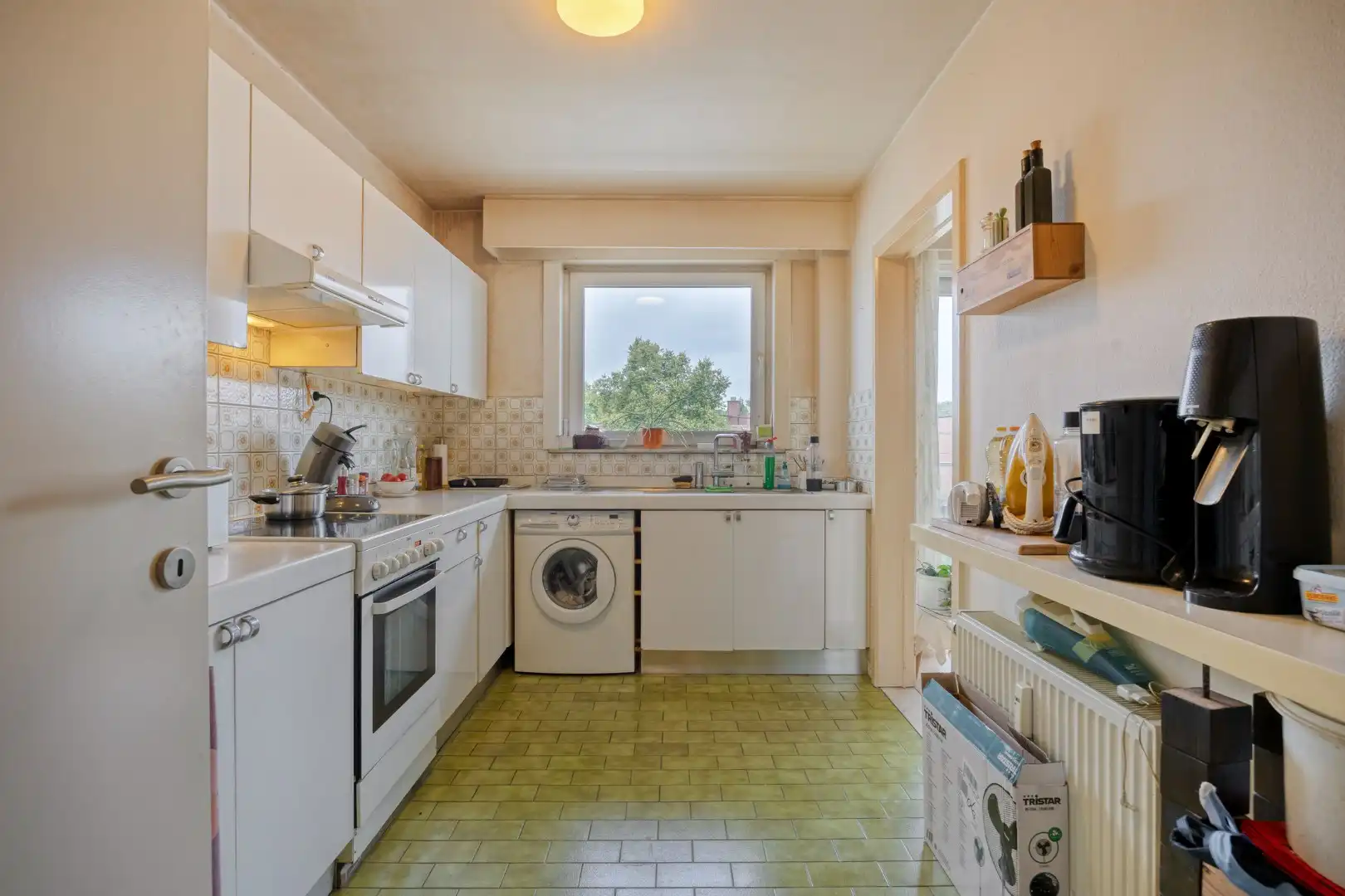 1-slaapkamerappartement met terras en private kelderberging in Linden! - EPC 133 kWh/m² - bewoonbare opp. 69m² foto 9