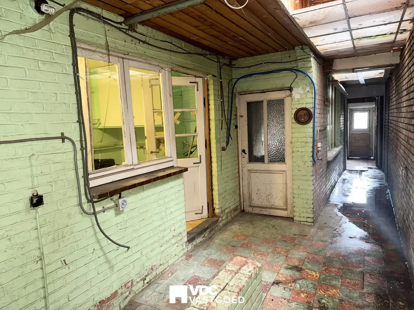 Te renoveren woning met werkplaats, garage en veel potentieel foto 26