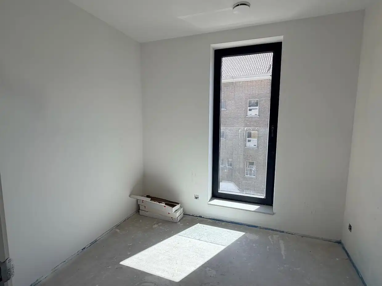Modern nieuwbouwappartement met 2 slaapkamers en ruim terras in centrum Lubbeek foto 13
