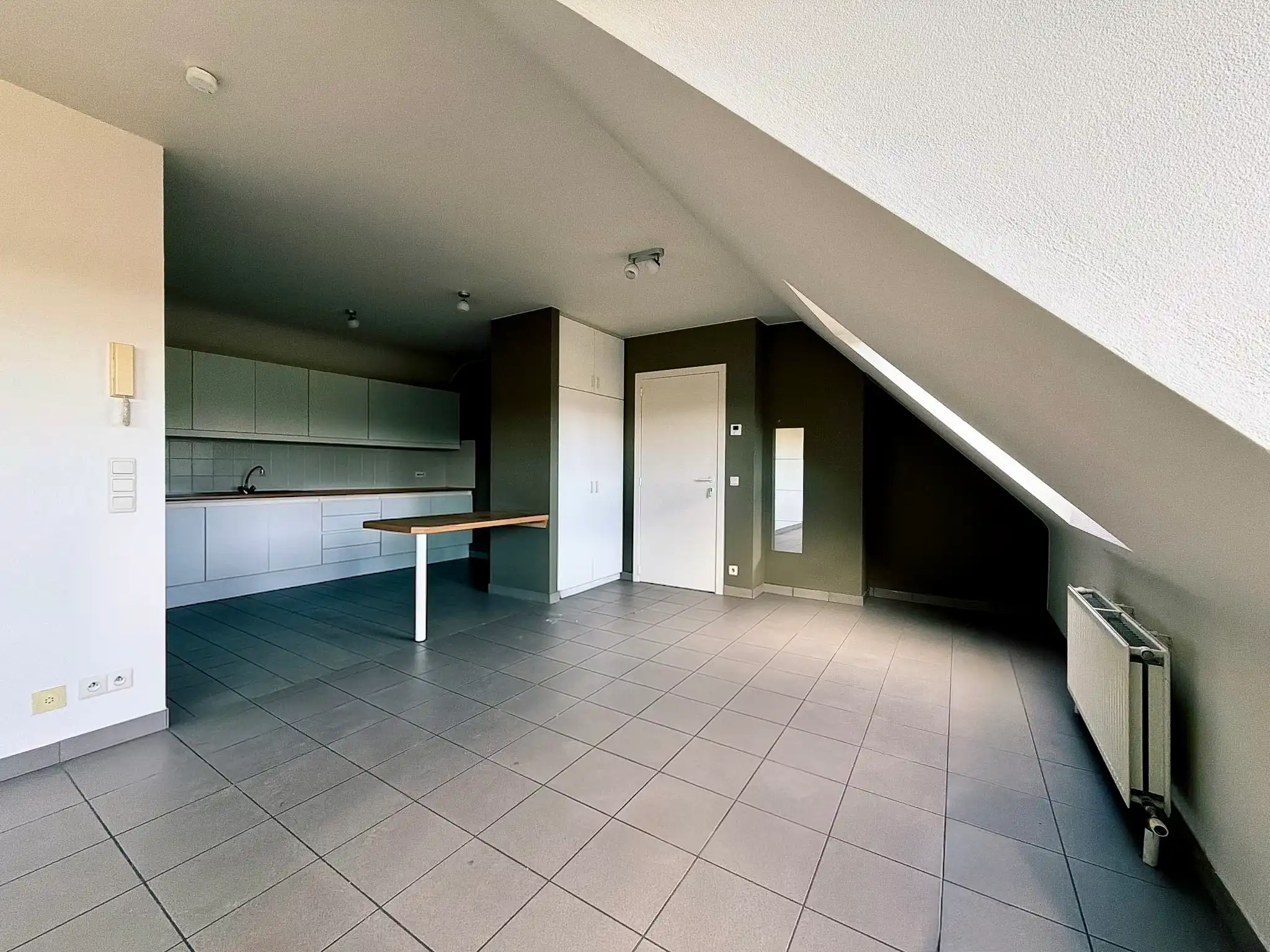 Centraal gelegen 1-slpk appartement te huur in Wetteren foto 7