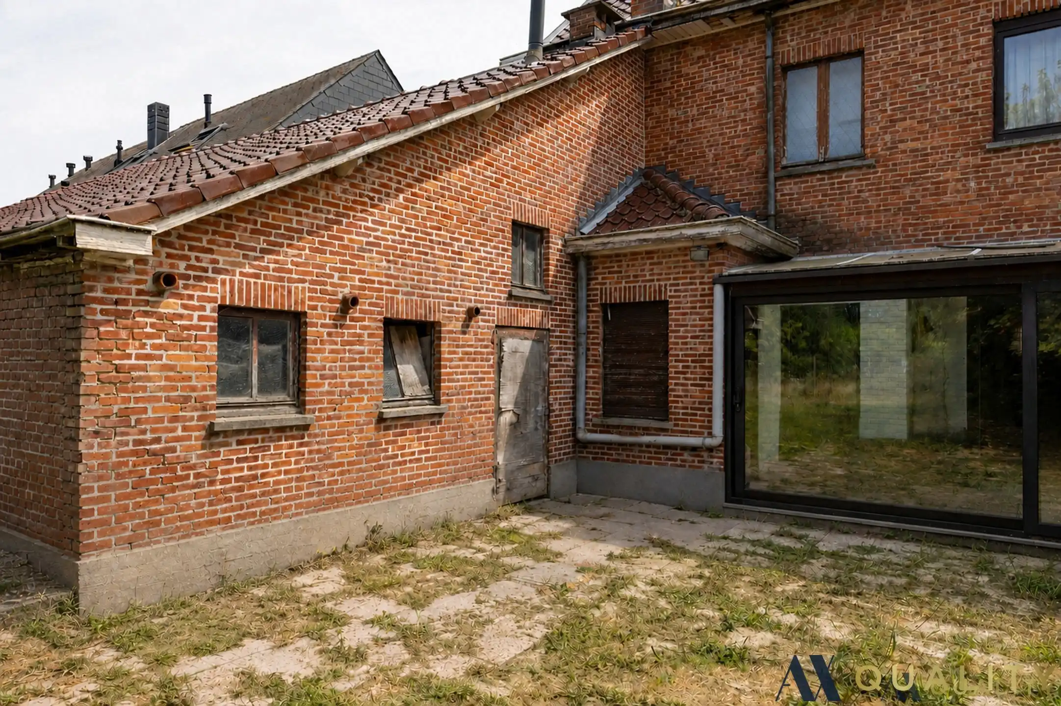 Te renoveren gesloten bebouwing met garage, ruime tuin en groenzicht in Oppuurs foto 2