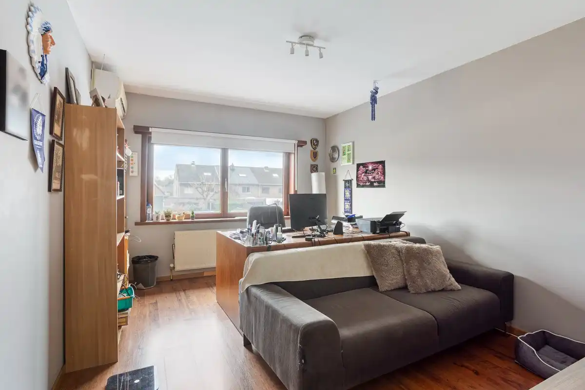 Rustig gelegen instapklare B-label gezinswoning met 5 slaapkamers, garage en zonnige tuin foto 14