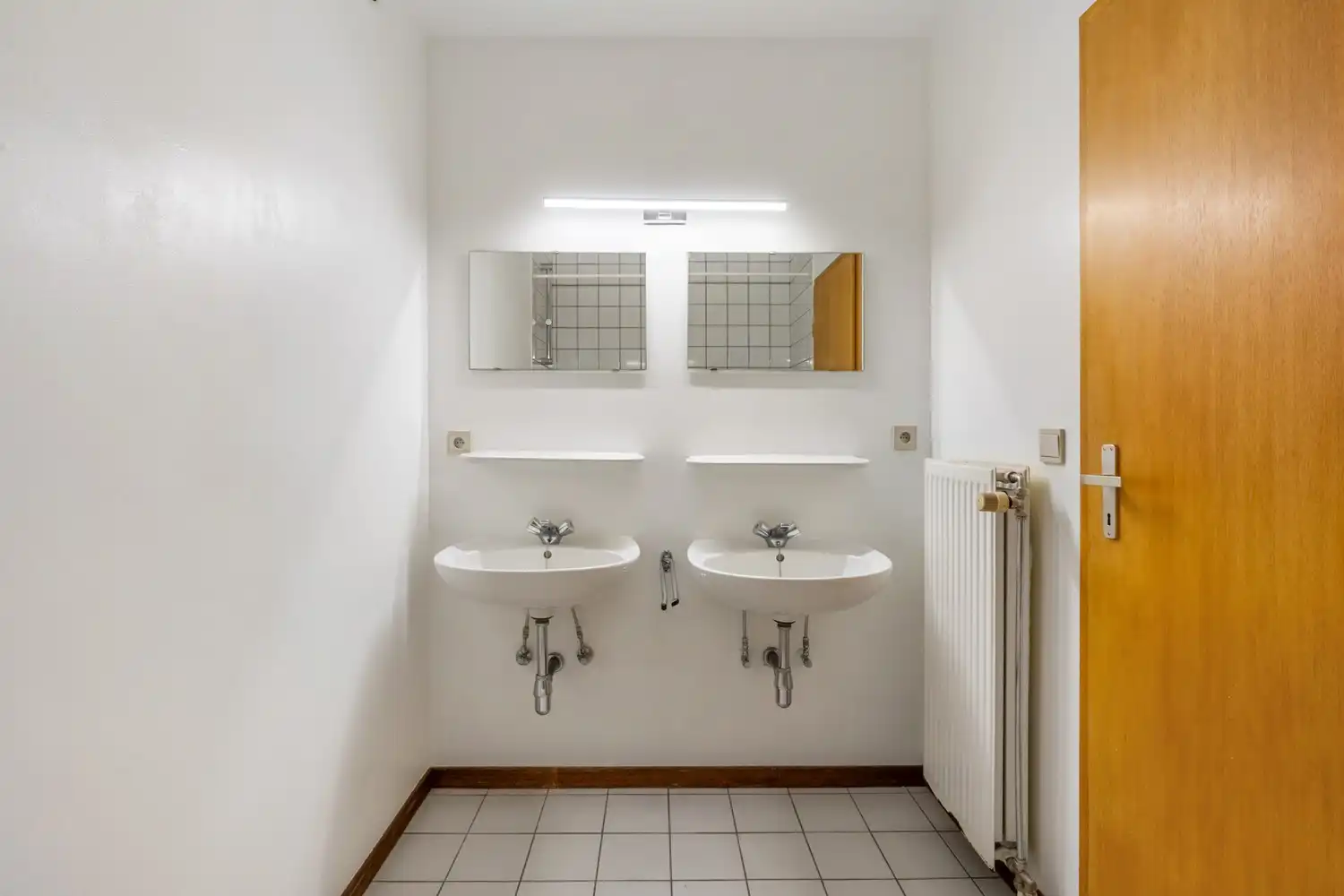 Goed gelegen hoekappartement met 2 ruime slaapkamers, een terras en een garagebox met parking ervoor te Kessel-Lo! foto 20