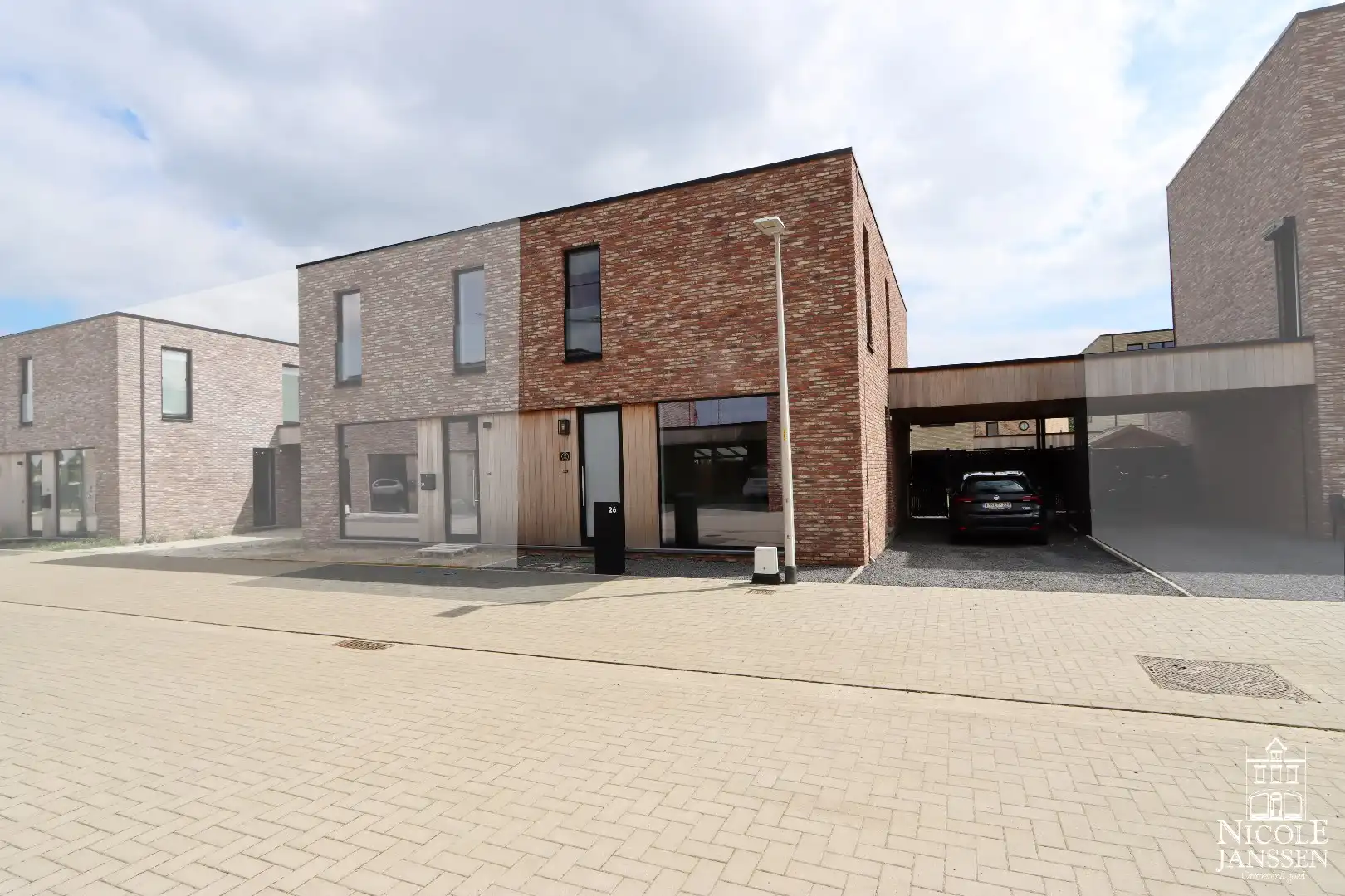 Instapklare nieuwbouwwoning met tuin te koop in Maaseik foto {{pictureIndex}}