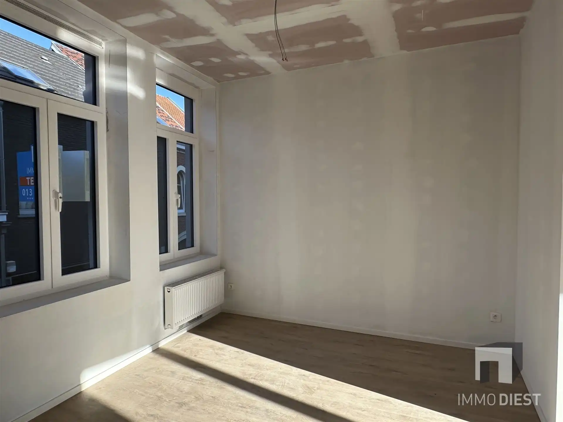 Opbrengsteigendom - 3 gloednieuwe appartementen + 1 handelspand foto 20