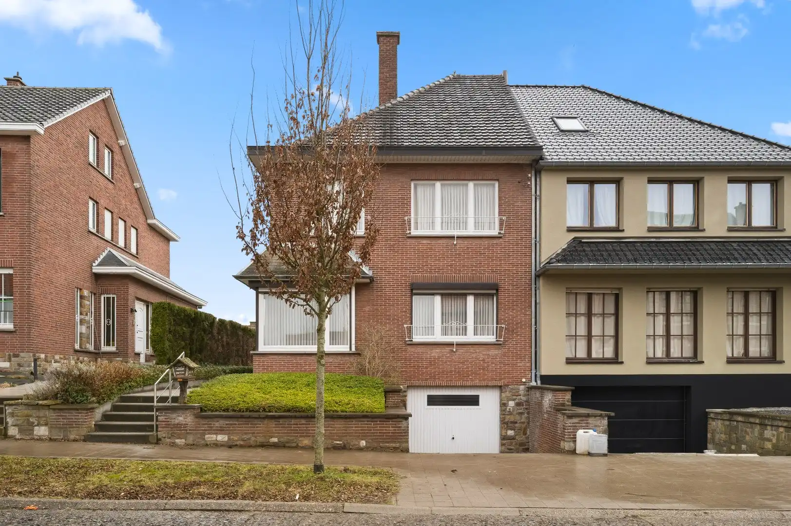 Op te frissen halfopen bebouwing op de Tiense stadsrand foto 2