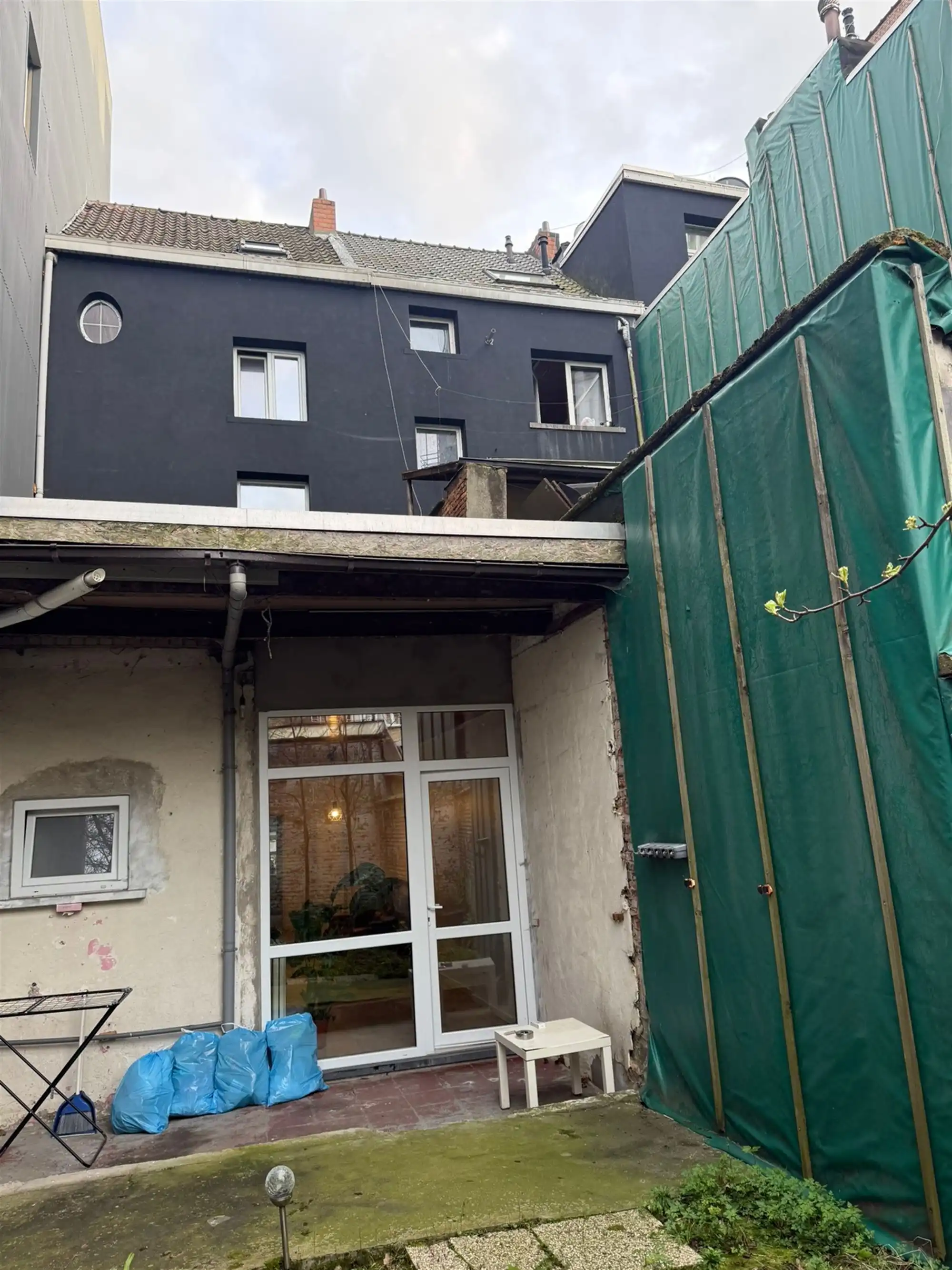 Opbrengsteigendom geacht vergund appartement + triplex foto 5
