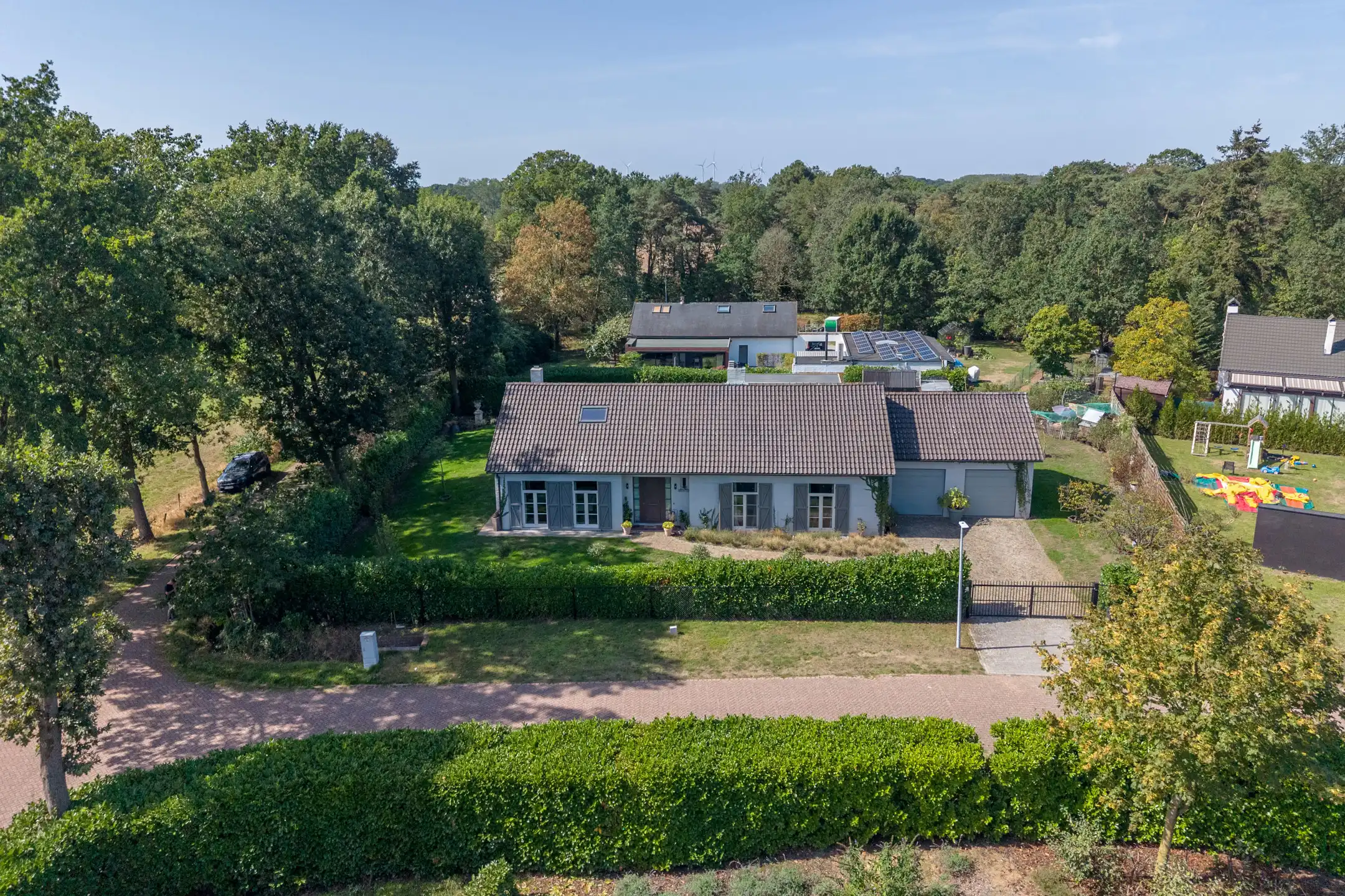 Stijlvolle gelijkvloersvilla met 3 slp op  1.443 m² (ZW) foto 31