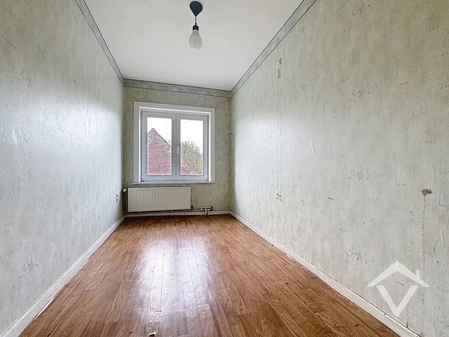 Alleenstaande woning met naastliggend stuk bouwgrond en weide te Eernegem foto 18