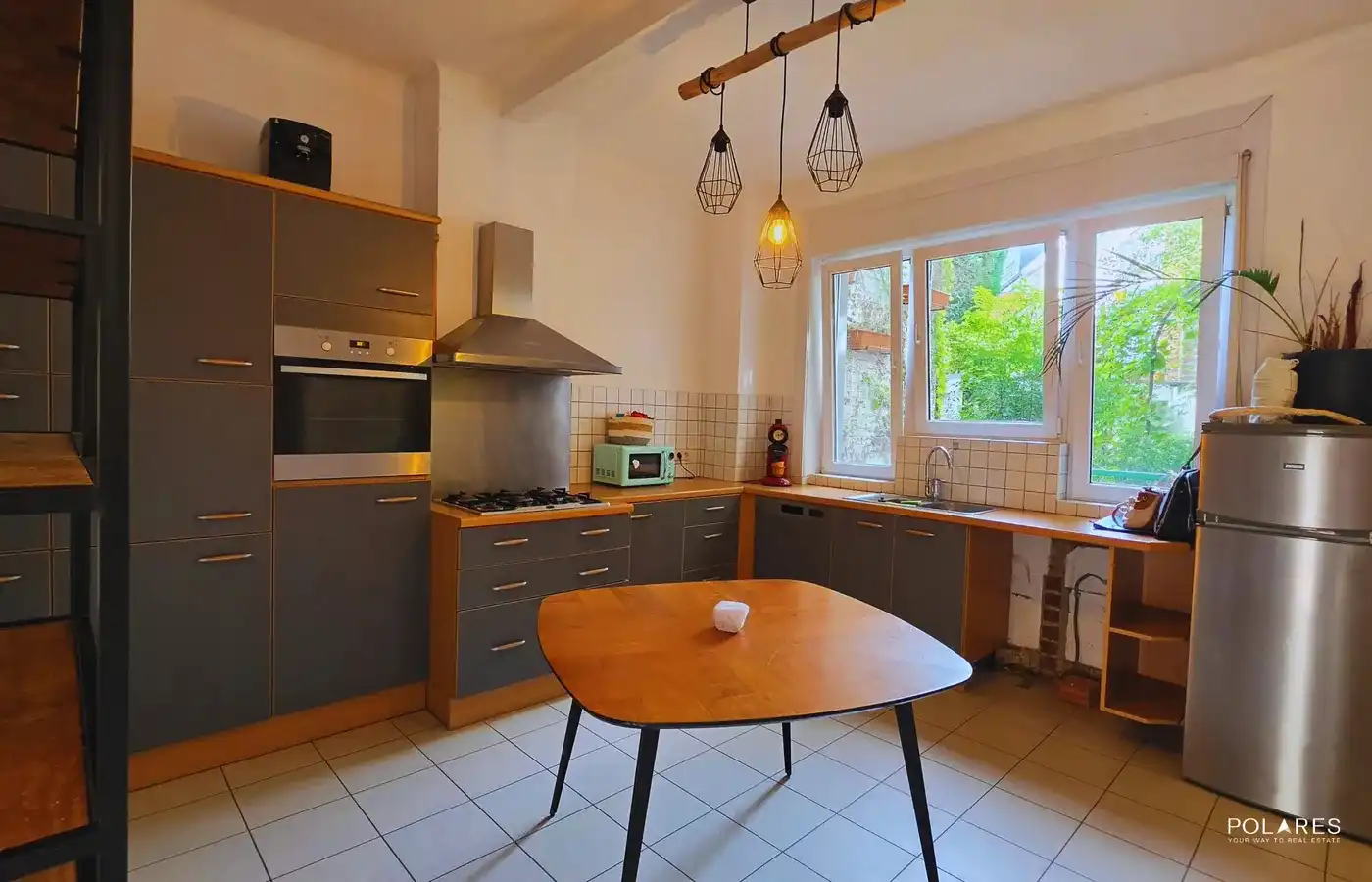 Gelijkvloers appartement met prachtige tuin én polyvalent bijgebouw! foto 5