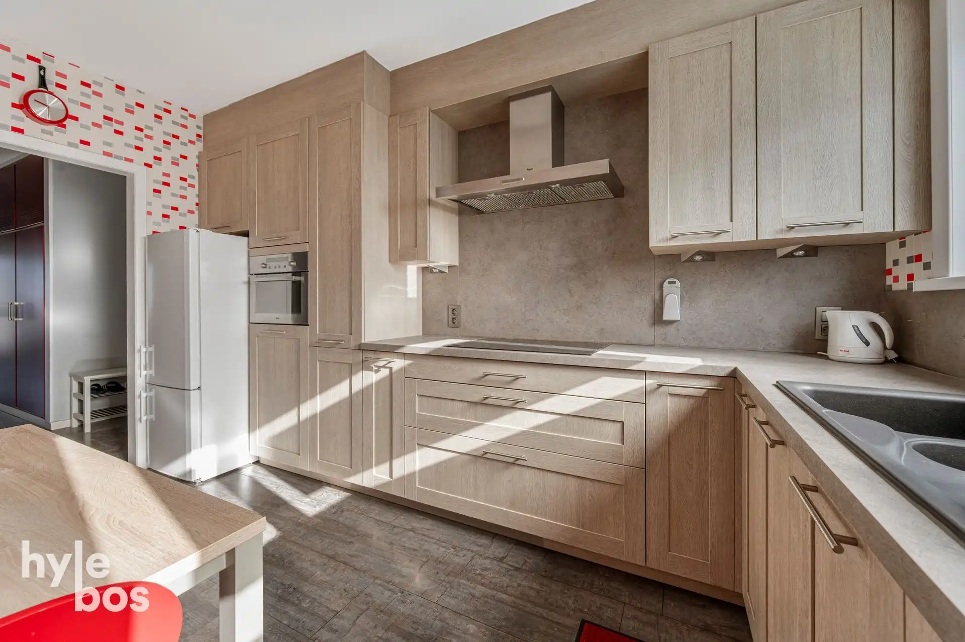 Ruim lichtrijk hoekappartement met garage foto 9