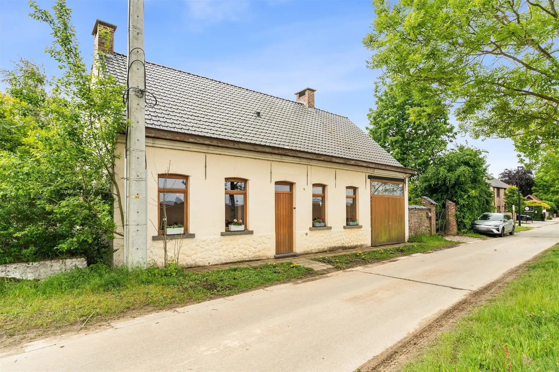 Charmante L-woning in het groene Oosterzele foto 2