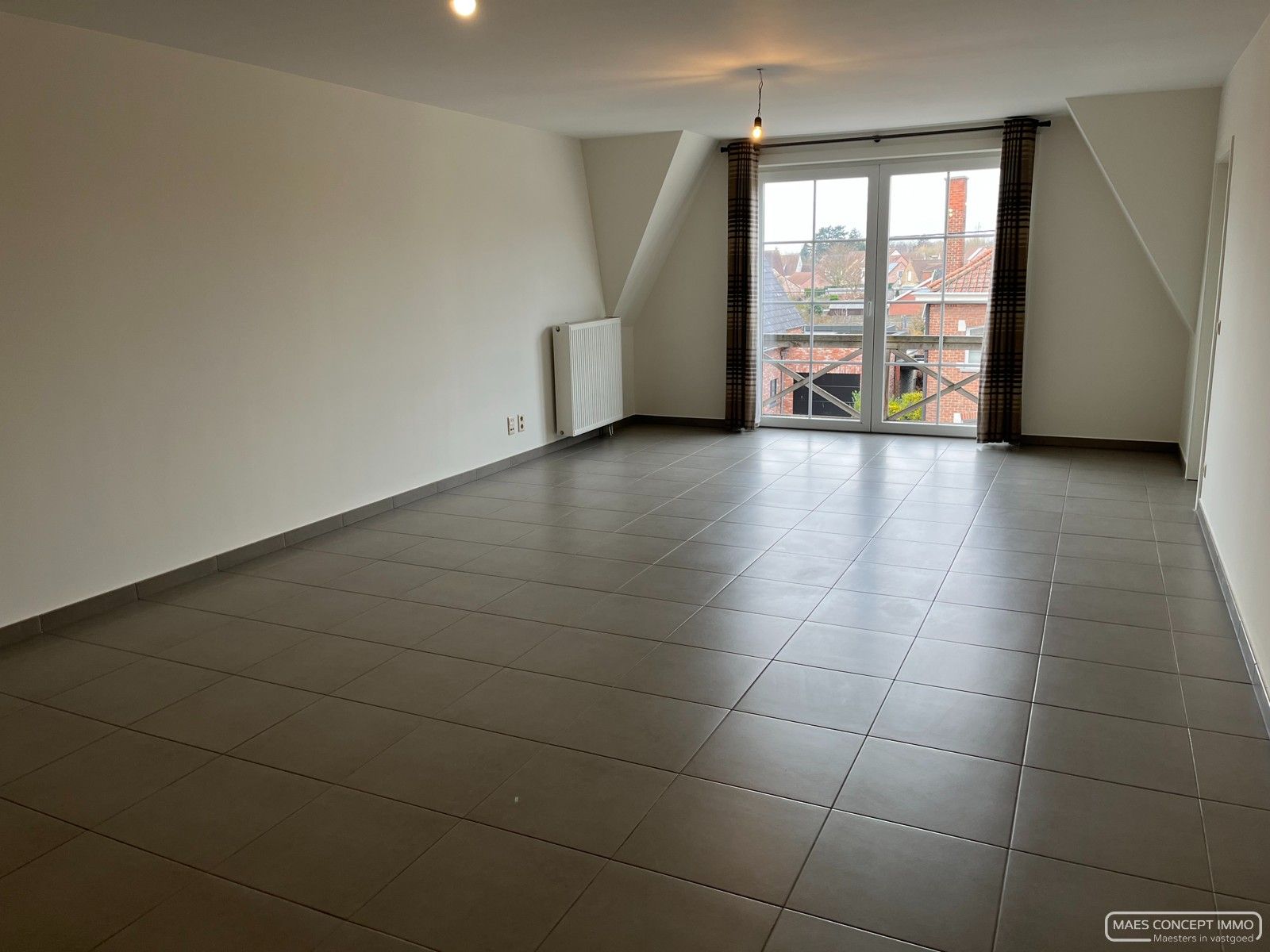 Appartement te huur dicht bij centrum Waregem met ondergrondse parkeerplaats foto 2