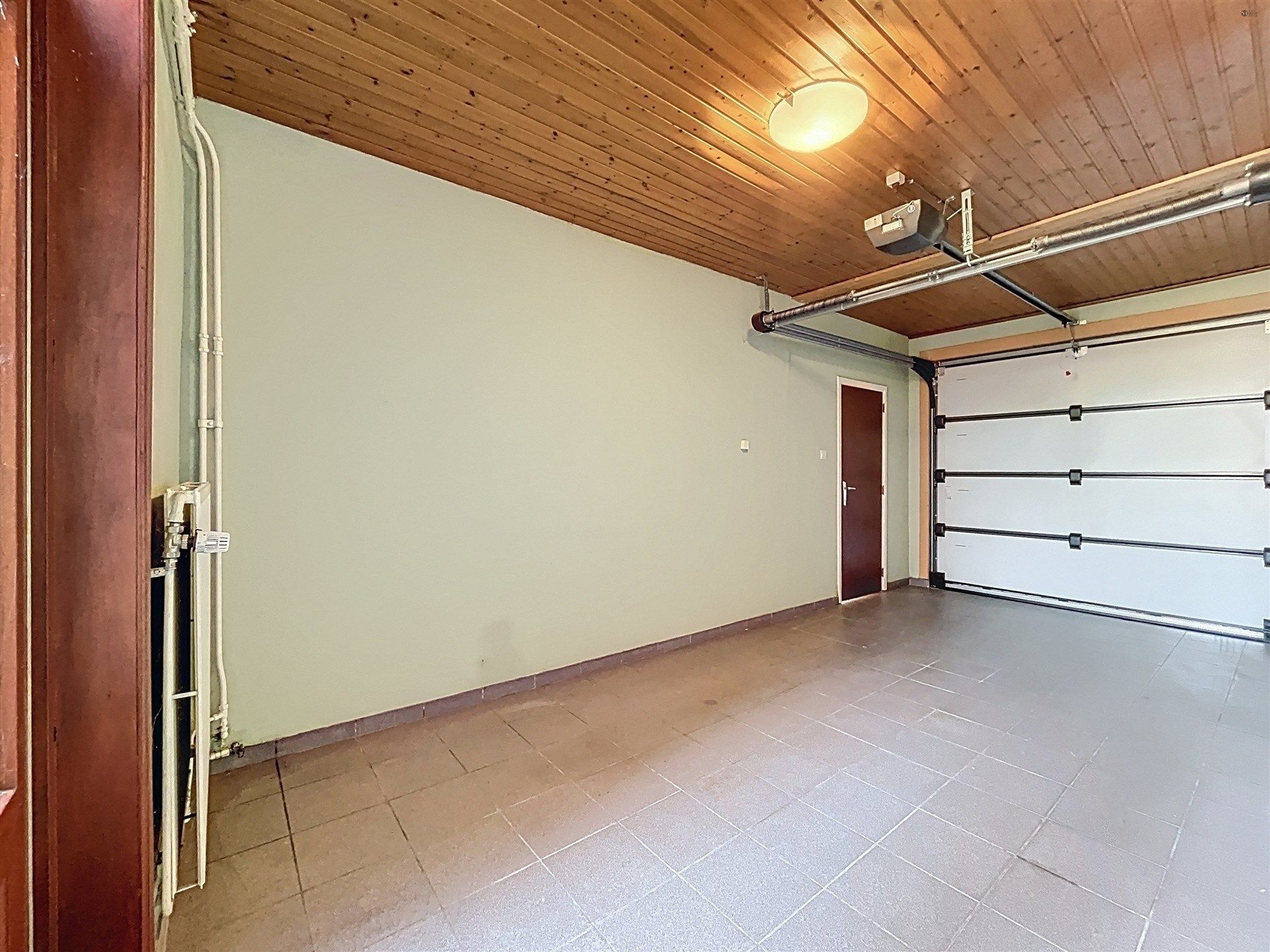 Ruime woning met garage op perceel van 512 m² foto 9