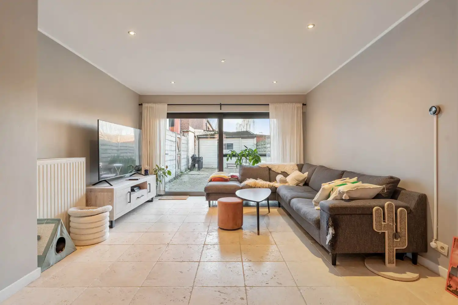 Goed gelegen halfopen bebouwing met 3 slaapkamers en een tuin met een poortje naar de straat te Wilsele! foto 7