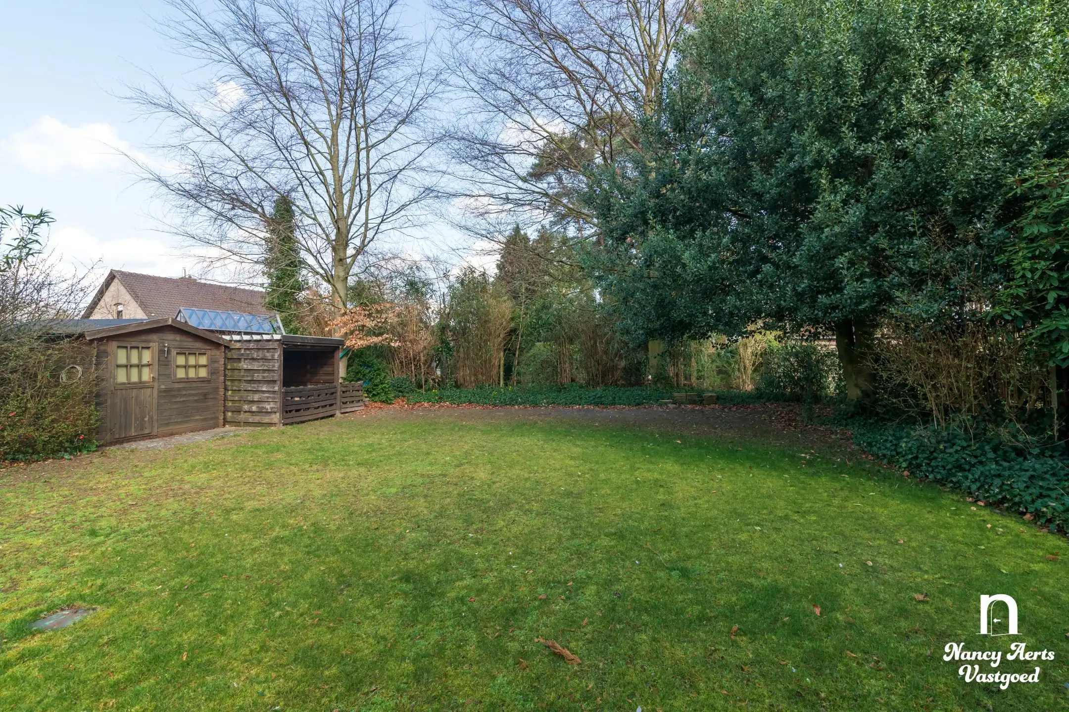 Goed onderhouden gezinswoning met grote tuin foto 9