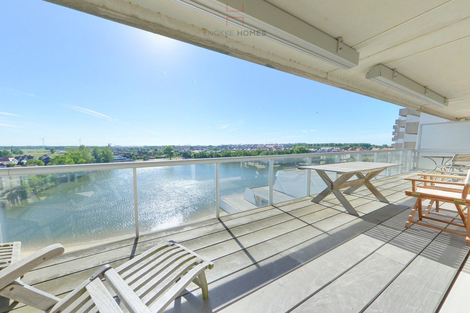 Riant appartement met open zicht over het meer van Duinbergen foto {{pictureIndex}}