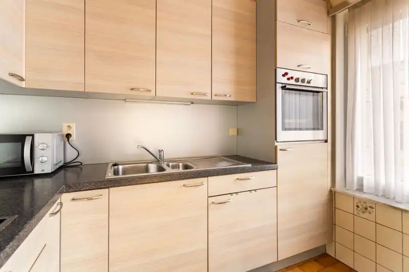 Gelijkvloers 2 slpk. appartement met tuin en garage foto 6