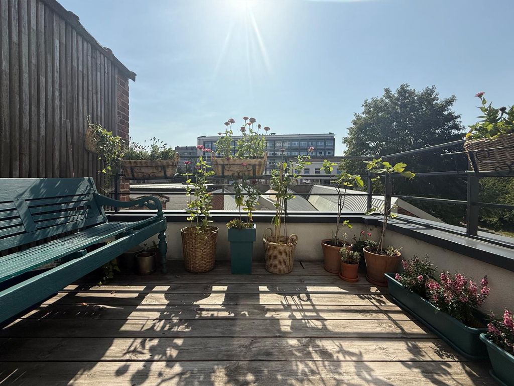 Omgeving Sint-Pietersstation. Ruim 2 slaapkamer appartement met aangenaam terras en zicht op groen, zowel aan de voor- als achterzijde foto 5