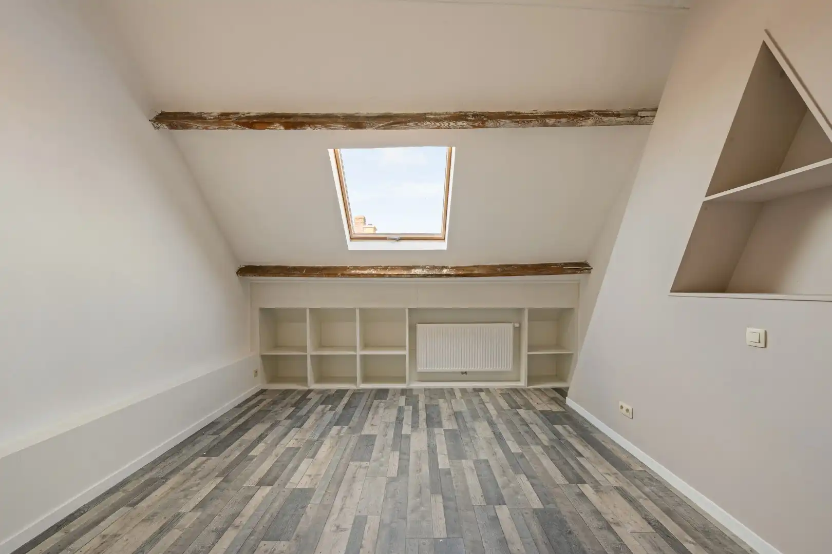 Rijwoning met 2 slaapkamers en ruime zolder in Menen foto 12