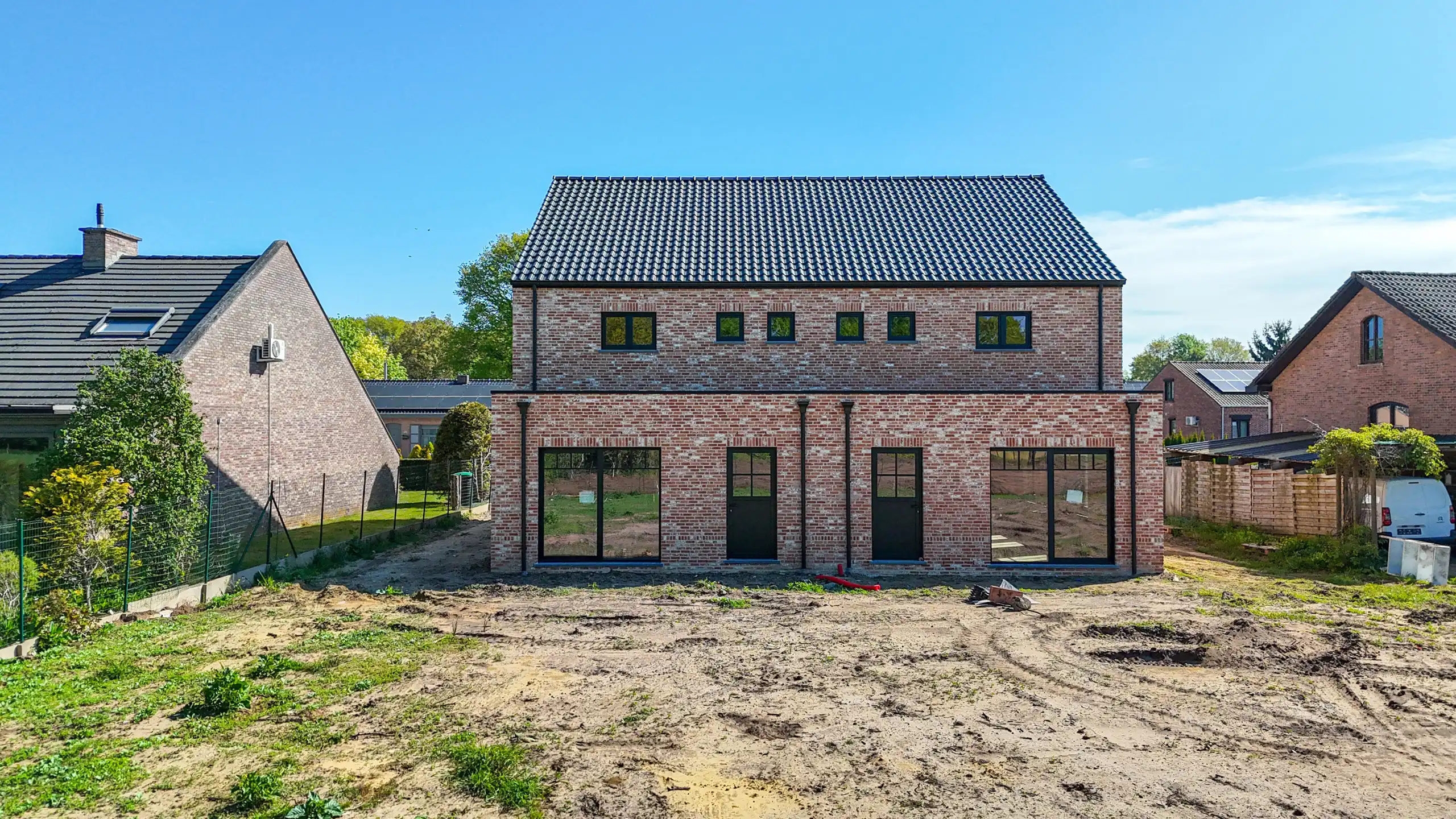 Tijdloze nieuwbouwwoning met 4 slpks + uitzicht op het groen! foto 11