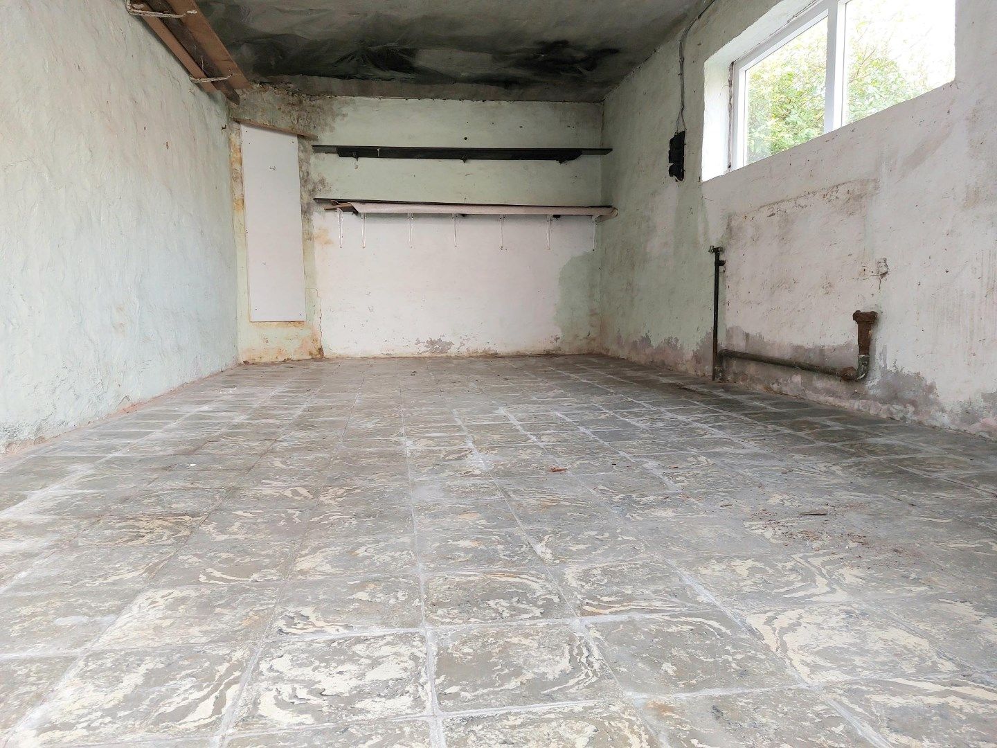 Gelijkvloersappartement met terras en garage foto 14
