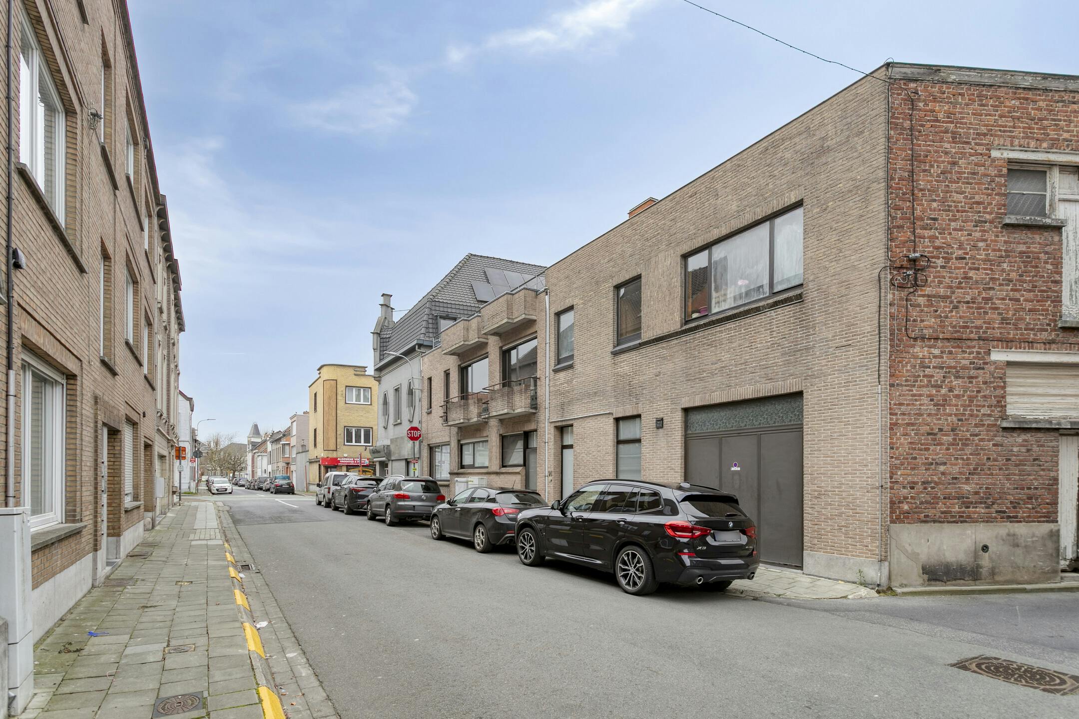 Handelspand met woonst te koop in centrum Menen foto 16