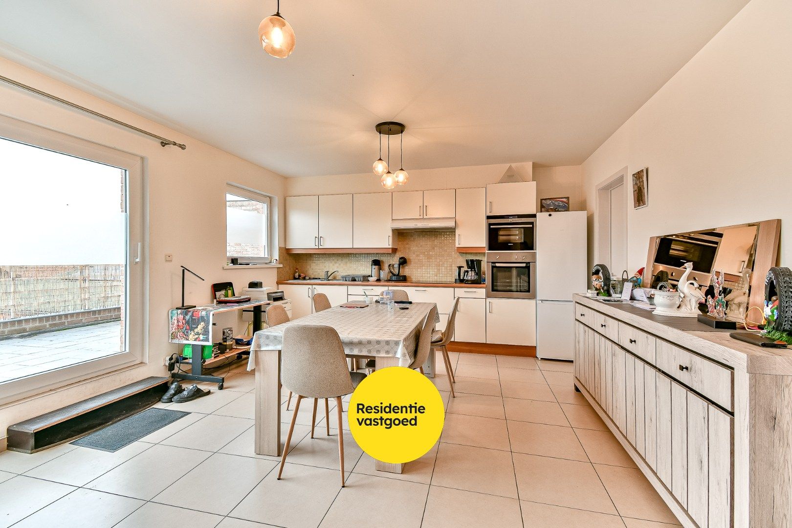 Opbrengsteigendom met 3 appartementen en 3 garages foto 11