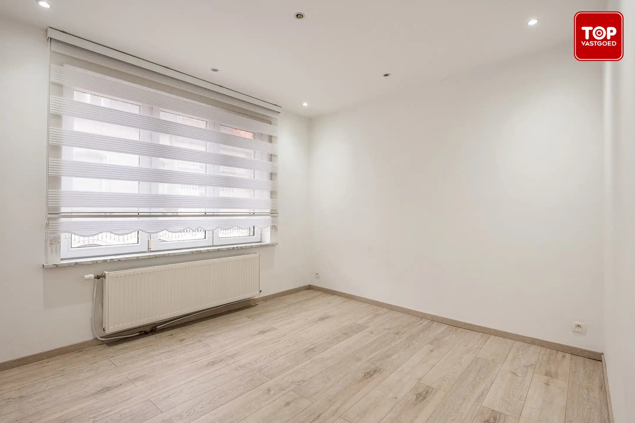 Instapklare woning met stadkskoer op gunstige locatie. foto 11