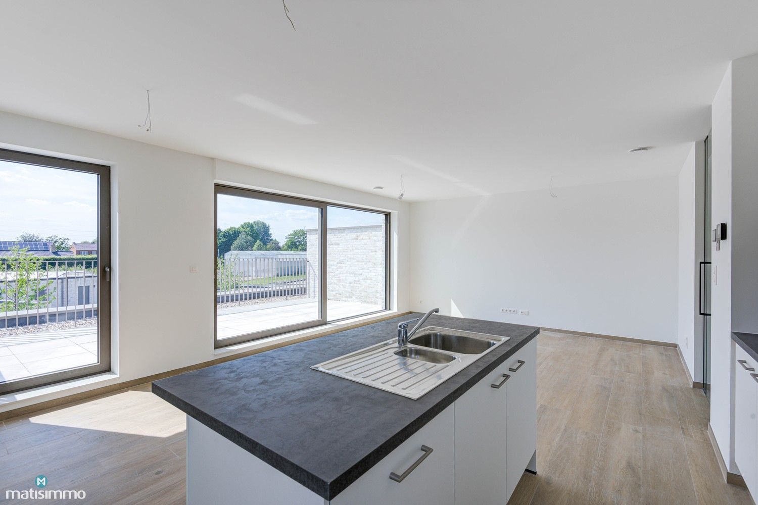 NIEUWBOUWAPPARTEMENT MET TWEE SLAAPKAMERS, RUIM TERRAS EN PARKEERPLAATS TE MUNSTERBILZEN foto 5