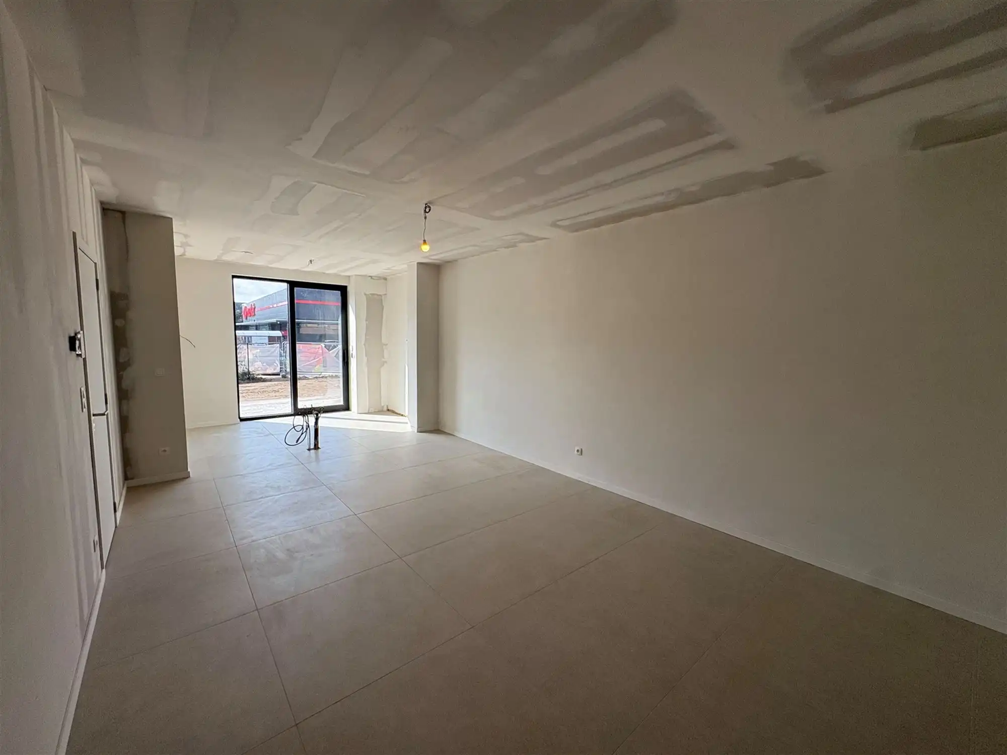 Nieuwbouwappartement met 1 slaapkamer en extra grote tuin. foto 5