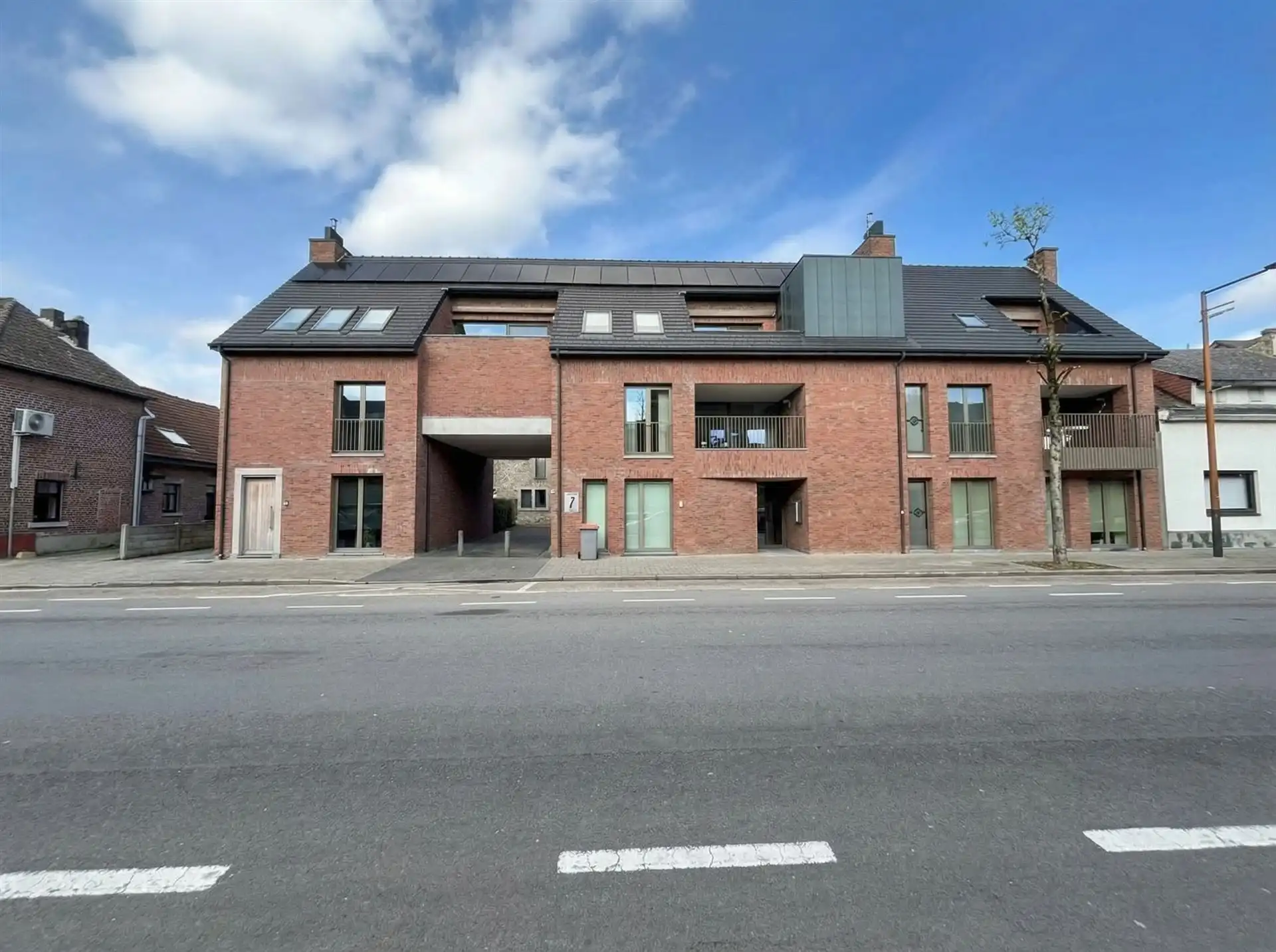 Instapklare, energiezuinige starterswoning met 2 slaapkamers, tuintje en ondergrondse parking op toplocatie in Maasmechelen! foto 15