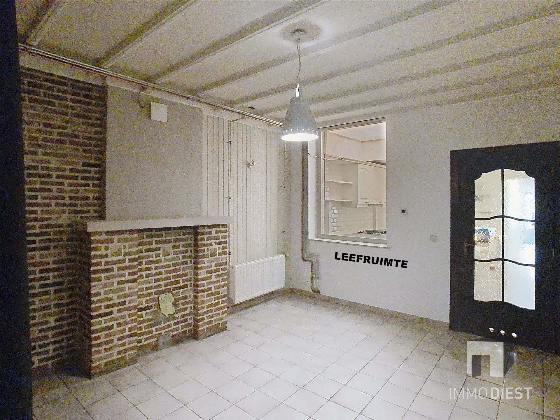 Gezellige rijwoning met terras en tuin foto 4